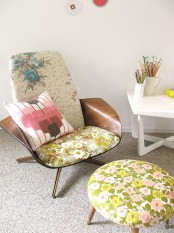 a pretty space with a catchy chair with mismatching floral upholstery, a floral stool and a desk is a cool and bold nook