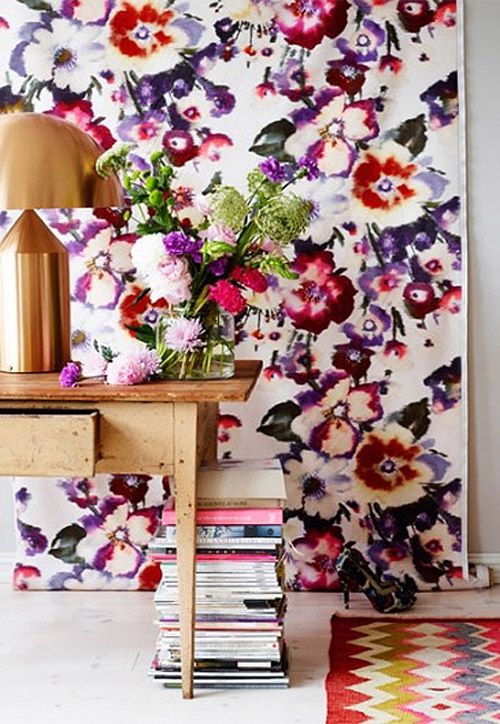 super bold floral wallpaper and a matching bright rug will make your entryway jaw dropping and ultimate