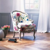 a refined vintage floral chair is a chic and bold idea for any space, it will add color and print to it