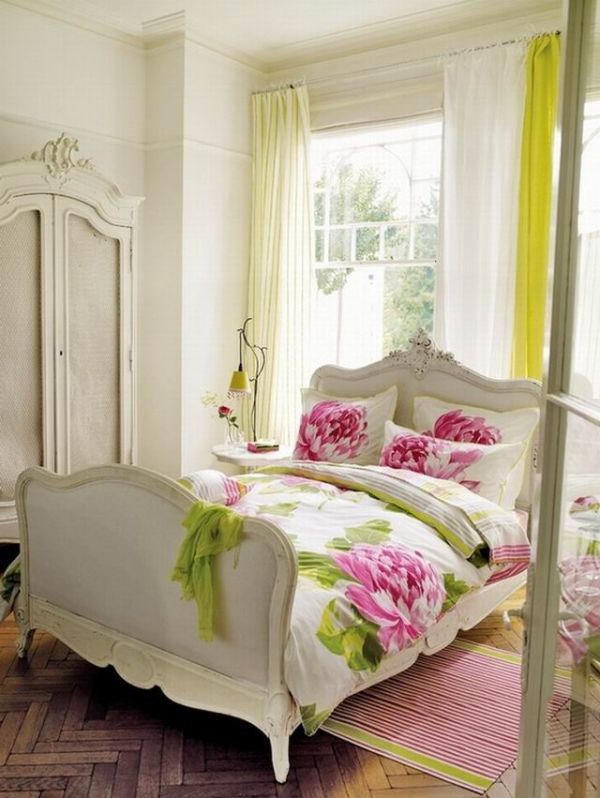 a refined neutral bedroom with a chic wardrobe, a refined bed and nightstands, neon green curtains and bright floral bedding is very chic