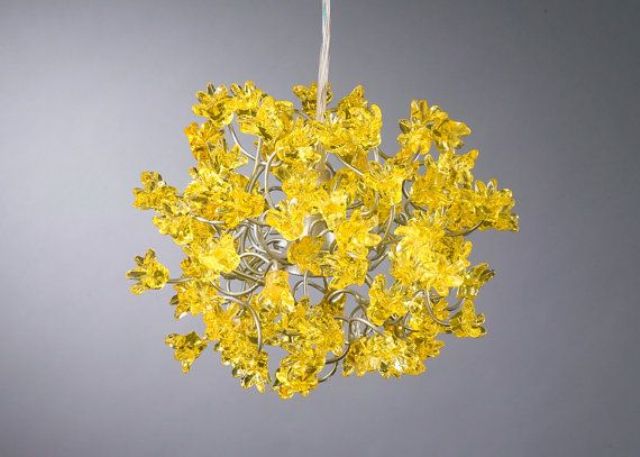 a fantastic mustard colored flower chandelier will make a statement in any space with its color and shape