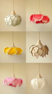 a whole number of fabric lampshades that very naturally imitate real flowers in various colors