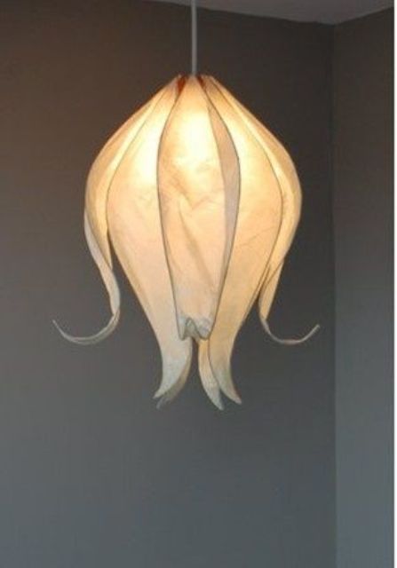 a neutral flower shaped pendant lamp is a chic idea to add a natural and blooming feel to your space