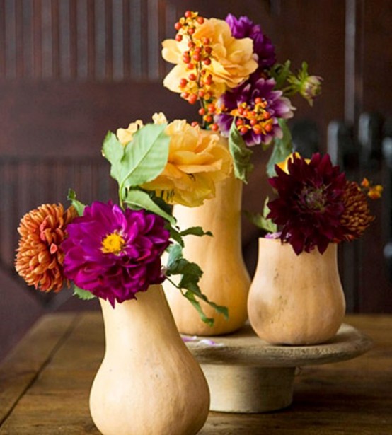 bright fall or Thanksgiving centerpieces of gourds and super bold blooms are amazing for a fall or Thanksgiving celebration