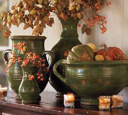 oversized green vases and bowls with dried leaves, berries and pumpkins and gourds are beautiful, cozy and chic
