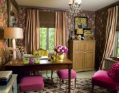dark floral wallpaper, hot pink stools and soem bright blooms make the space feel like spring but with a whimsy touch
