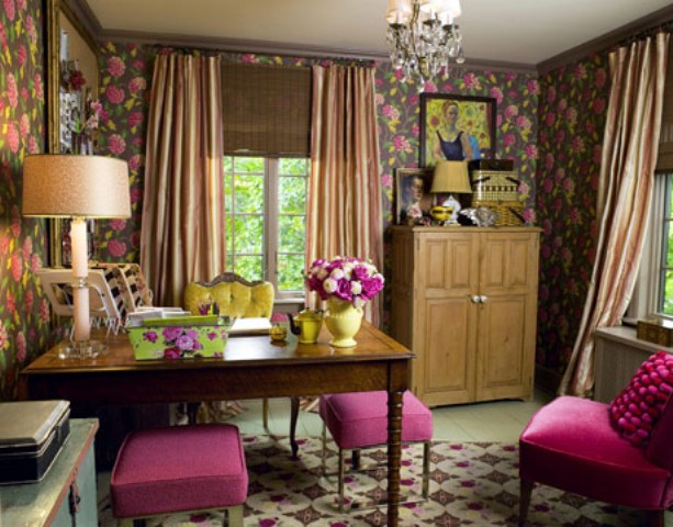 dark floral wallpaper, hot pink stools and soem bright blooms make the space feel like spring but with a whimsy touch