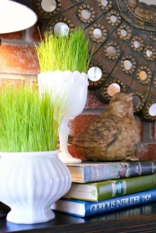 white vases and jars with wheatgrass will give a fresh feel to the space and still keep it refined and vintage