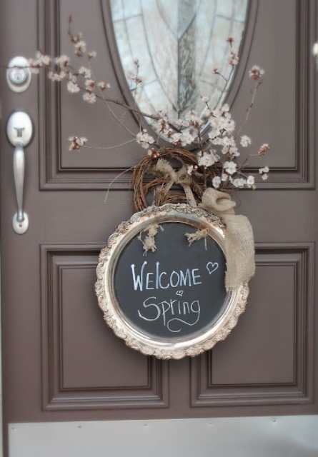 a refined rustic spring sign with a chic tray with a chalkboard bottom, some vine, blooms and a burlap ribbon