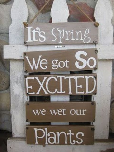 a simple taupe spring sign of plaques and with rope is a cool rustic decoration for indoors or outdoors