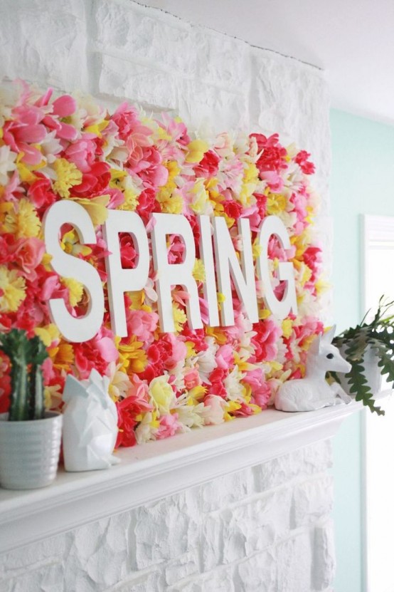 a creative spring sign made of bright faux blooms and some letters is a fantastic idea for your mantel