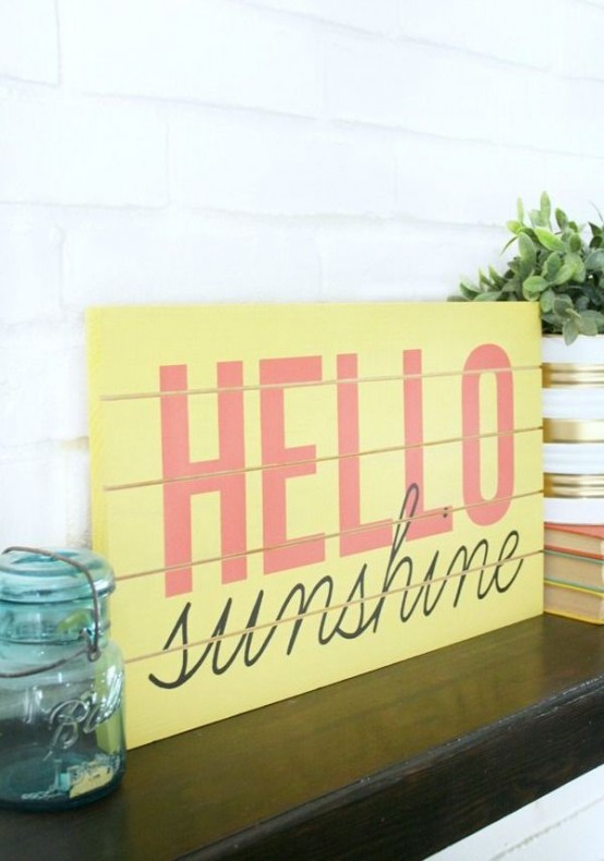 a yellow plaque sign with red letters and calligraphy is a simple and cheerful idea for a bright touch