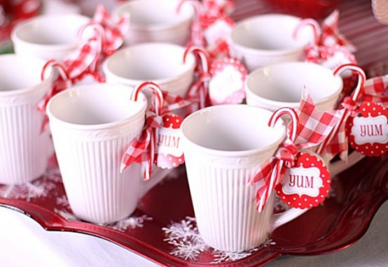 serve warm drinks and accent the mugs with candy canes and plaid ribbons to give them a strong festive feel