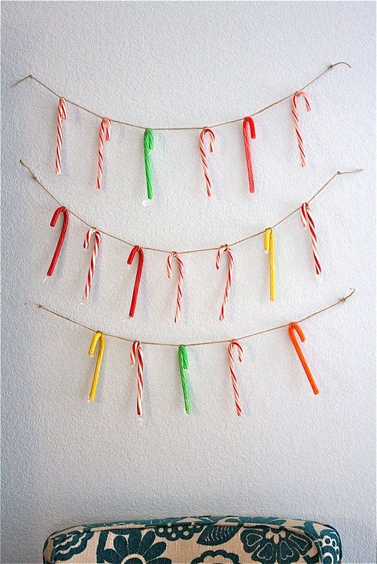 twine with colorful candy canes is a fun and bright idea of Christmas or holiday decor to rock and it can be easily done yourself