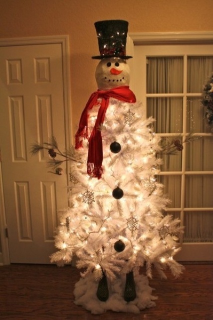 a snowman Christmas tree - a white tree with a snowman head, a tall hat, lights and a red scarf is a lovely idea