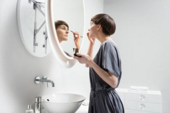 a lit up round mirror that can be regulated and moved back and forward is a smart idea if you use it for makeup or shaving