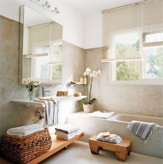 a large frameless mirror that features a bit of storage space is a lovely idea for a modern or contemporary space and it looks ethereal and lightweight