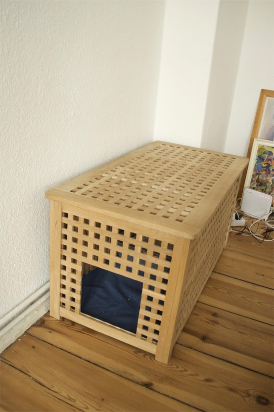 a long IKEA Hol table with a pet bed inside - let your pet sleep inside to feel safe and hidden