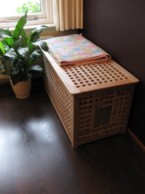 an IKEA Hol table as a hidden pet bed or loo can be placed anywhere and the inside will be more or less hidden