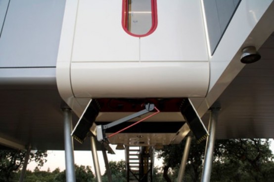 Futuristic Modular Spaceship Home On Metal Legs