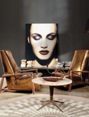 low glam gold leather chairs are a bold statement in the space, they make it stand out for sure
