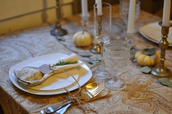 gold and brass cutlery and candleholders will make your wedding tablescape refined, chic and vintage-inspired
