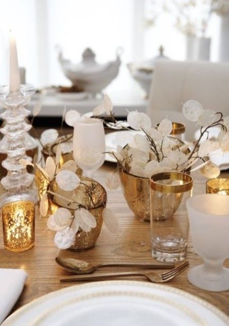 gold candleholders, gold rim glasses and cutlery will make a Thanksgiving tablescape refined and beautiful