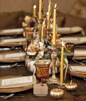 gold candleholders, gold pumpkins, leaves and chargers are amazing for Thanksgiving