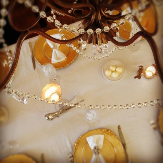gold chargers and candleholders, crystals will add a refined and chic feel to your Thanksgiving table