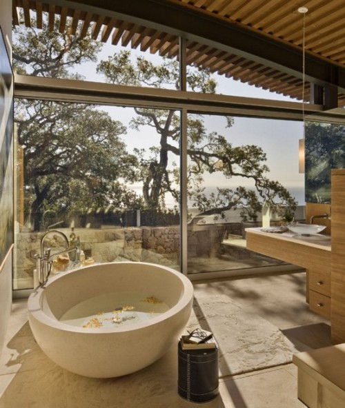 Gorgeous Bathroom With A Glass Wall