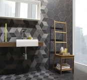 a contemporary dark-colored bathroom with geometric tiles, hexagons with color blocking and without looks amazing