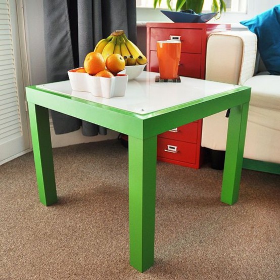 a green IKEA Lack table hack with a white tabletop is a bold and eye-catchy solution that will add color to your space