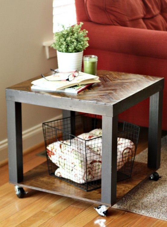 an IKEA Lack table hack with black paint and some chevron timber on top, plus an additional shelf and casters is a stylish and functional piece to rock