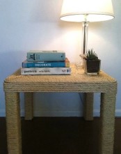 an IKEA Lack table fully covered with jute is a lovely idea for a coastal, beach or seaside space and such a DIY won’t cost you much