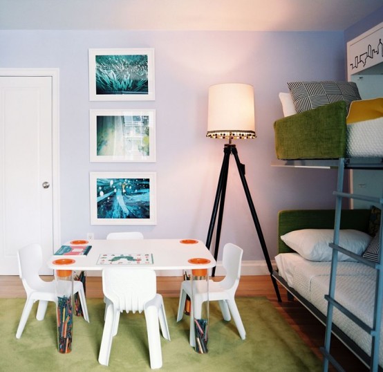 Green kids bedroom that is designed for having little guests.