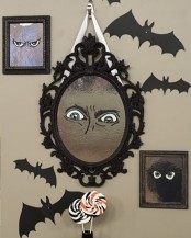 scary mirrors with eyes can be easily made by you and your children together