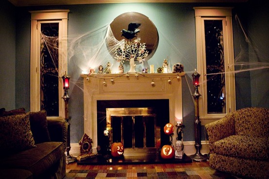 Do you have a mirror or a picture hanging above a mantel? If so, you can easily hang cheesecloth "cobweb" on it.