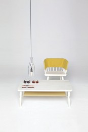 Hammock Table And Dowel Chair Decorated With Bright Fabric