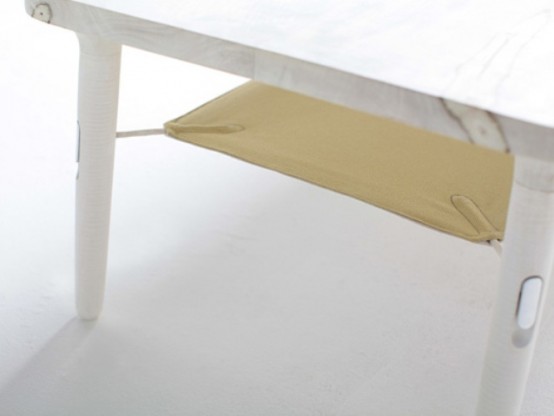Hammock Table And Dowel Chair Decorated With Bright Fabric