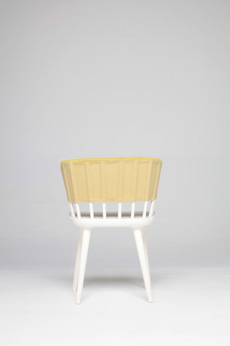 Hammock Table And Dowel Chair Decorated With Bright Fabric