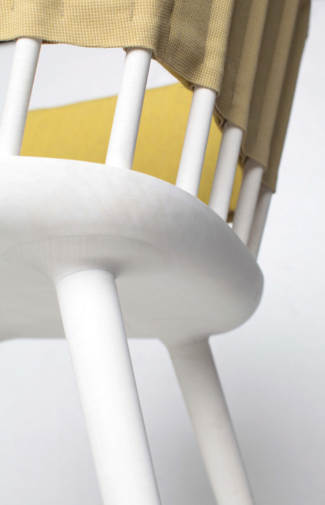 Hammock Table And Dowel Chair Decorated With Bright Fabric