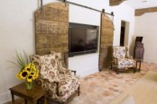 a TV hidden with large rough barn doors are a great idea for a modern rustic or farmhouse interior