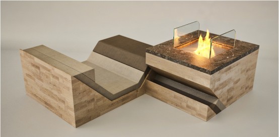Stylish Hillside Fireplace Comprised Of A Sofa Chair And A Coffee Table