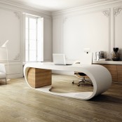 a neutral sophisticated home office with white walls and molding, with a sleek storage unit, a beautiful curved white desk and a lovely chair