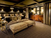 a lovely home cinema with a home bar