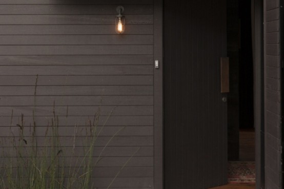 Home With A Country Feel In Dark Shades