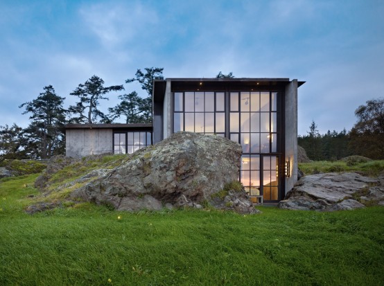 Pierre House With A Contrasting Interior Nestled Into The Rocks