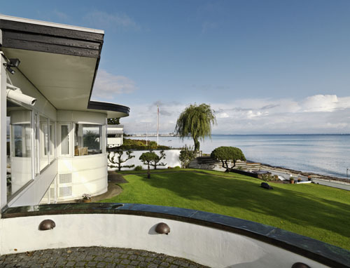 House Shaped as a Furniture Set With a Stunning View of The Sea