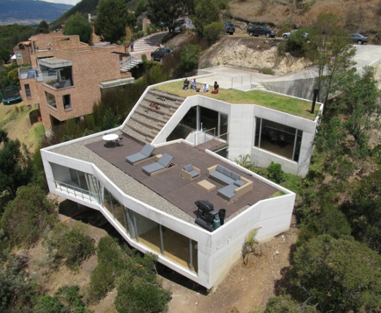 House With A Rooftop Garden And A Beautiful Deck On The Roof