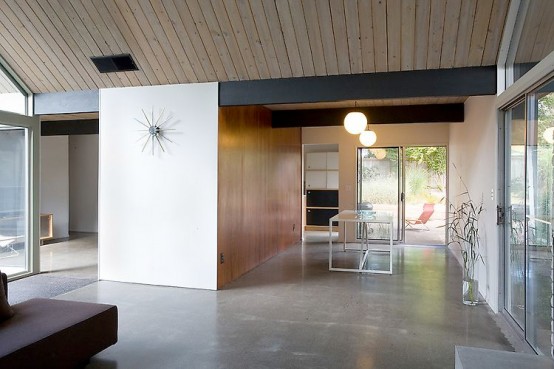 House Wraped Around The Open Atrium With High Double Gables